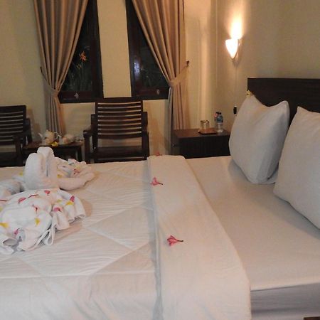 D'Batur Hotel Senggigi Kamer foto