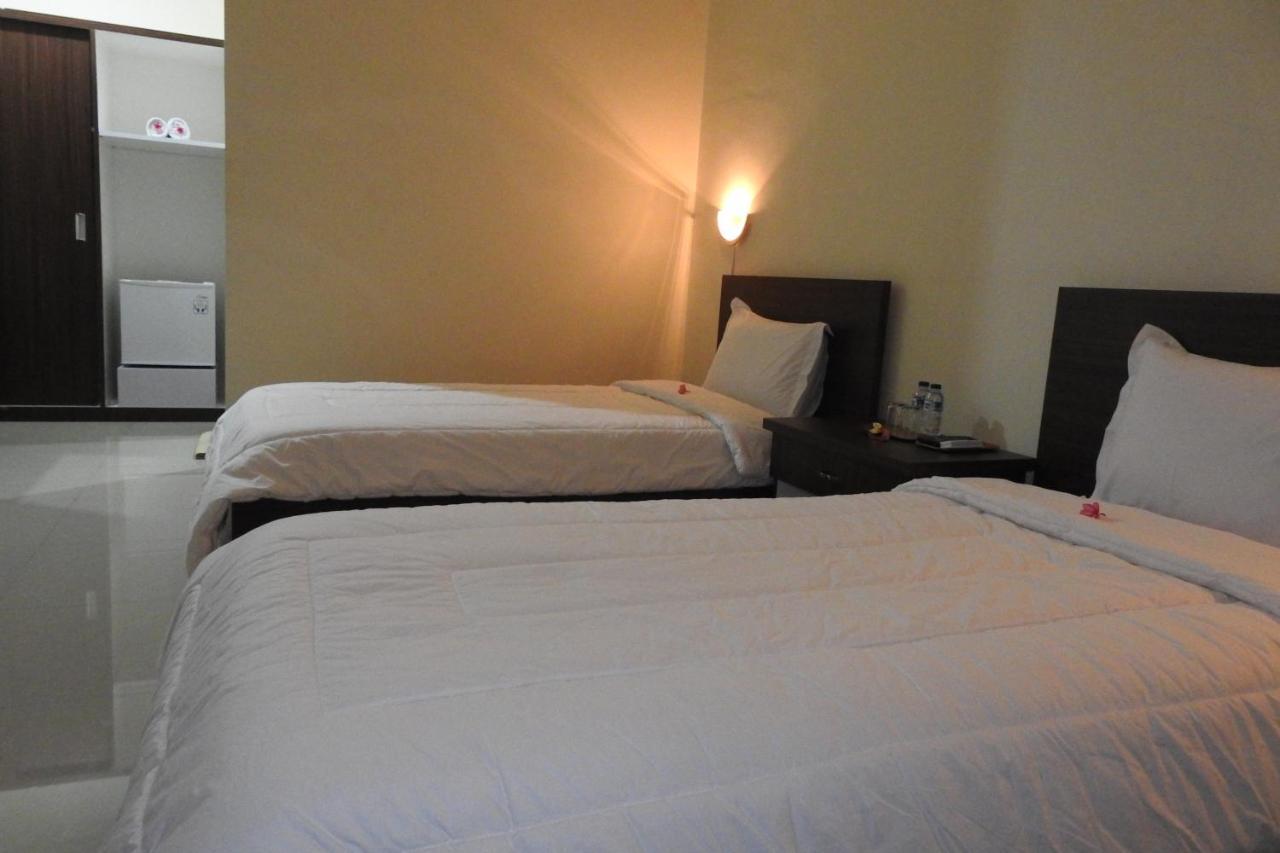 D'Batur Hotel Senggigi Buitenkant foto