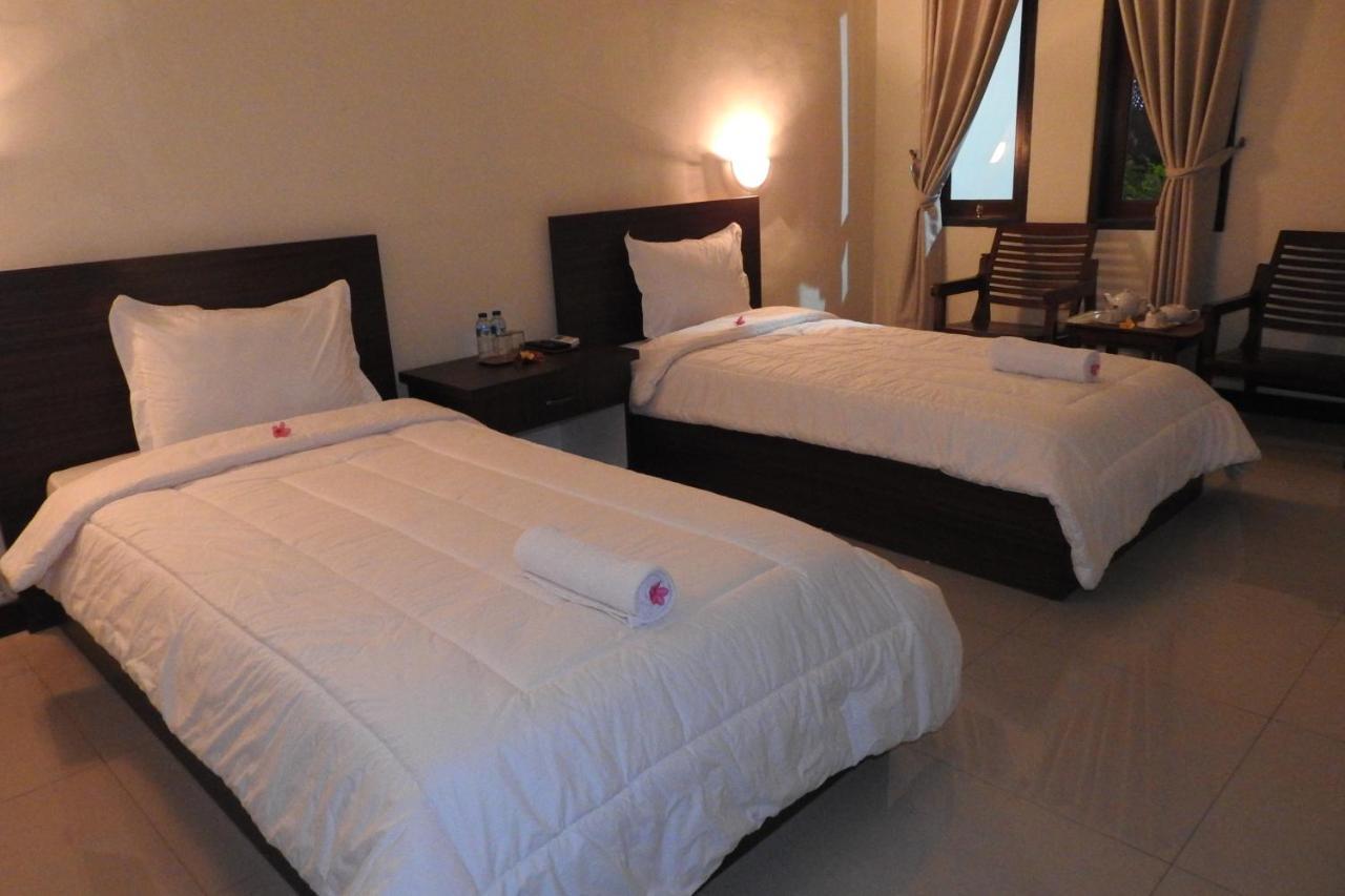 D'Batur Hotel Senggigi Buitenkant foto