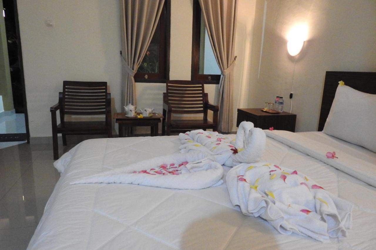 D'Batur Hotel Senggigi Buitenkant foto