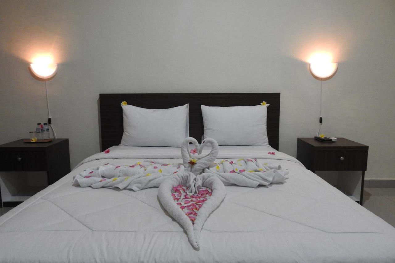 D'Batur Hotel Senggigi Buitenkant foto