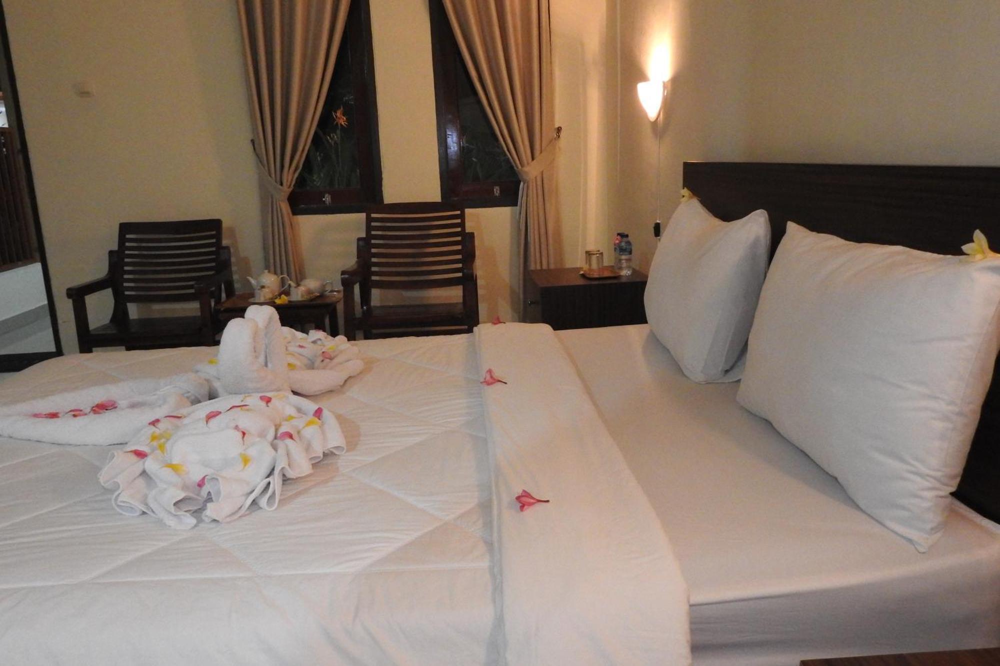 D'Batur Hotel Senggigi Kamer foto